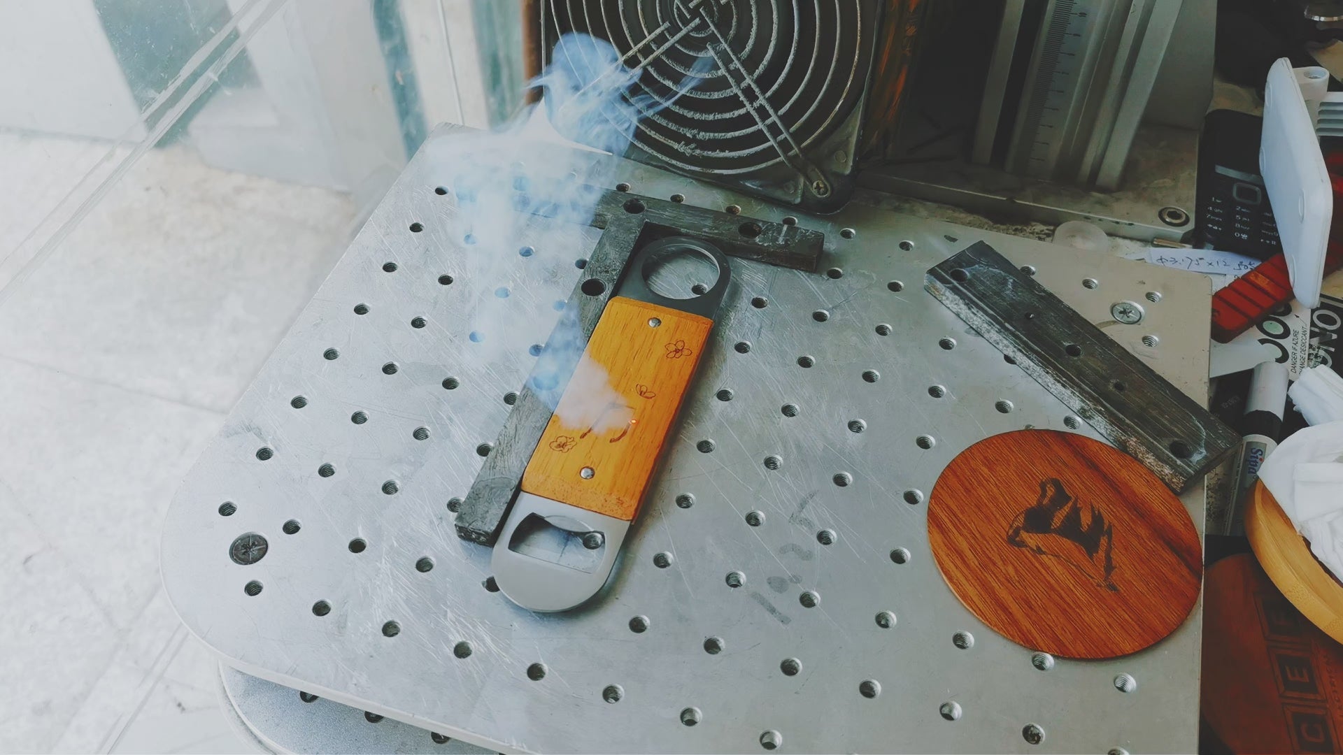 Load video: Ensaur Gifts, custom wood bottle opener, laser engraved bottle opener keychains. Custom gifts for promotion. Metal bottle openers, metal keychains, badges, leather cases and medals.